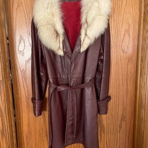 Beautiful burgundy leather coat with genuine fur collar.